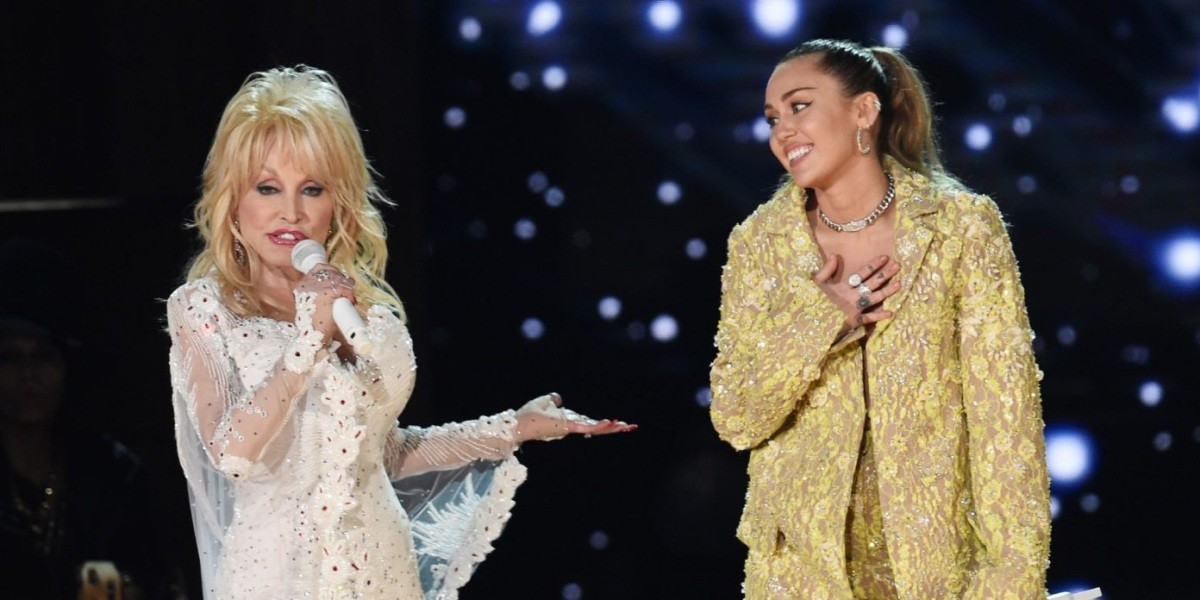 Dolly Parton and Miley Cyrus performing together on stage
