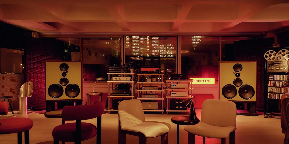 Spiritland's Barbican listening room with Living Voice speakers and lounge seating.