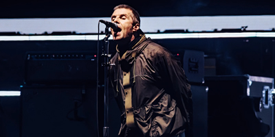 oasis returns to the stage after 16 years with explosive cardiff show